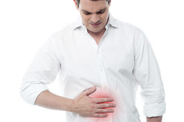 Man with upset stomach after eating food
