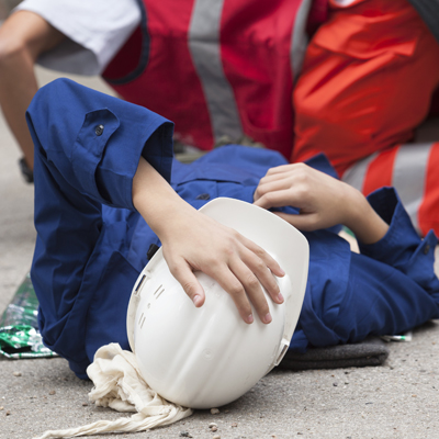 Tradie hurt, laying down