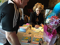 Karen signing books