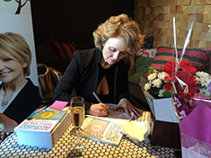 Karen signing books