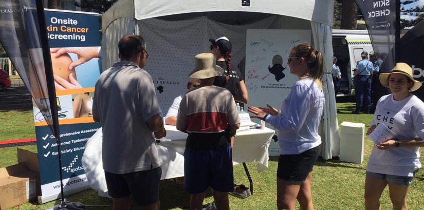 Skin checks at the Australian Open of Surfing in Manly, Sydney, 2016.