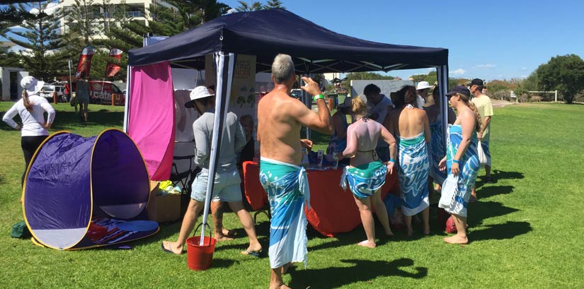 Spotscreen kiosk, performing skin checks for participants of the Purely Naked Skinny Dip event